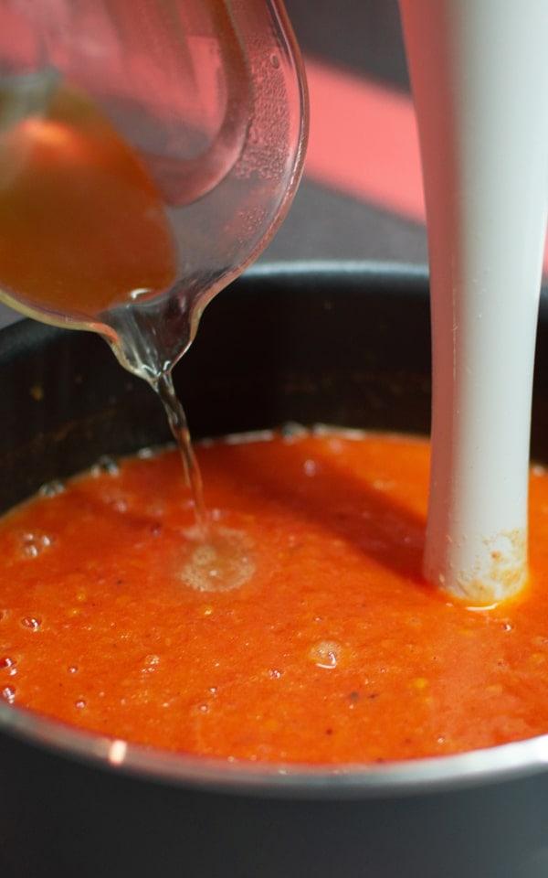 Adding broth bouillon to a tomato soup