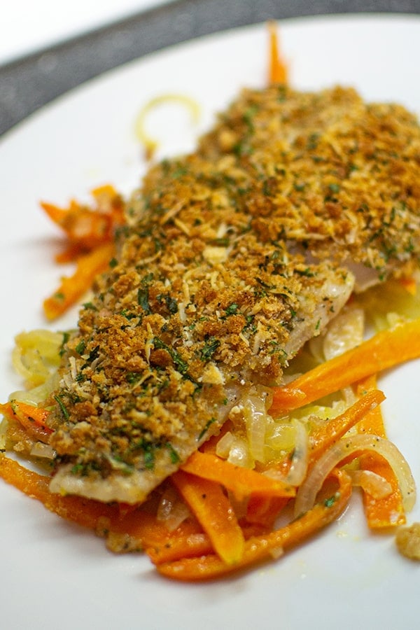 Delicious fish fillet with vegetables on plate