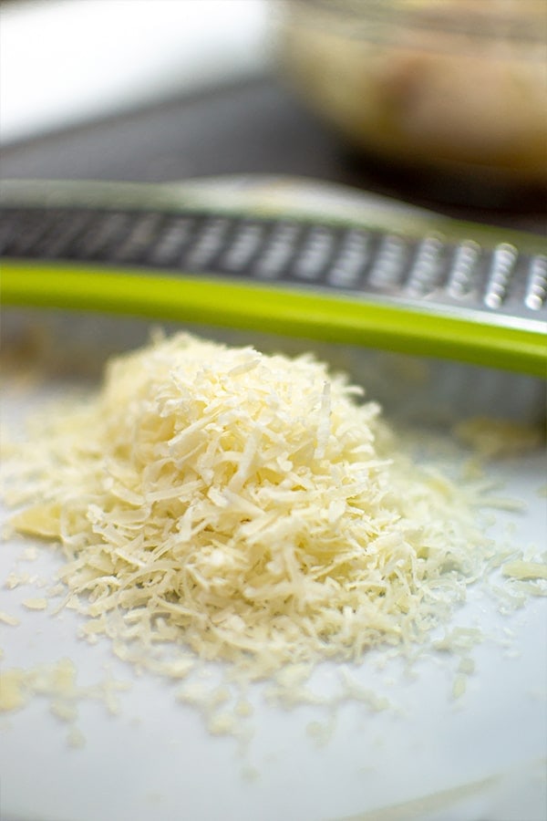 Parmesan cheese through the grater