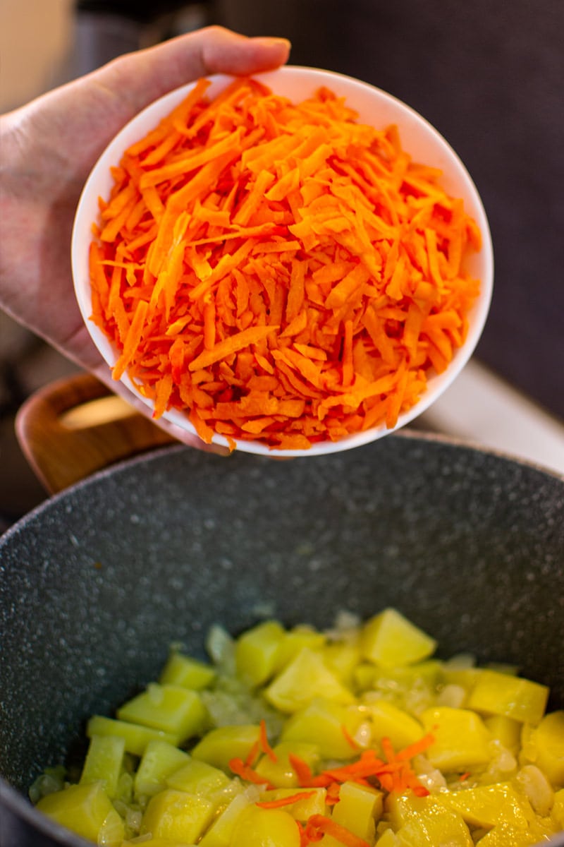 Adding Slices of carrots for an Ukrainian borscht