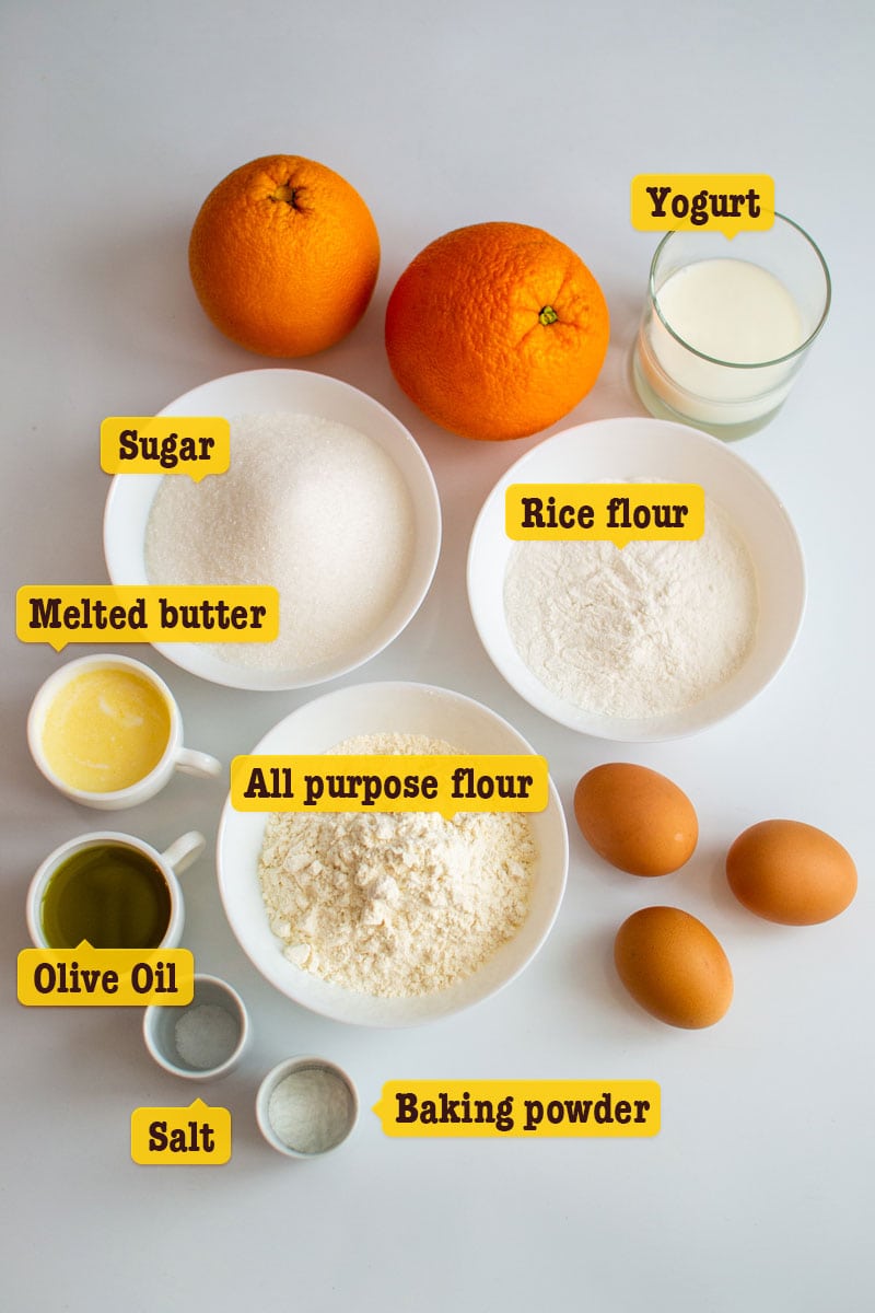 Ingredients for Sicilian Whole Orange Cake on white table