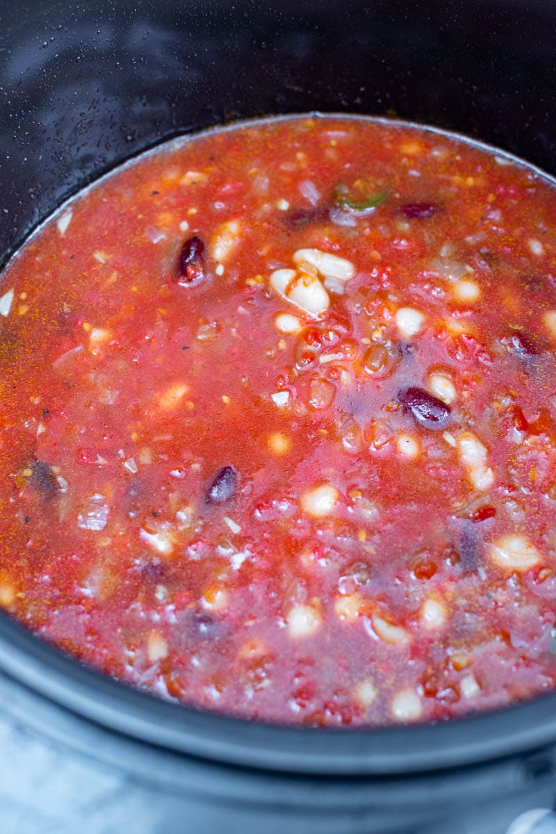 Tomato sauce with white and red beans.