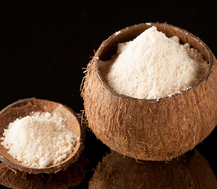 Coconut flour on a black background.