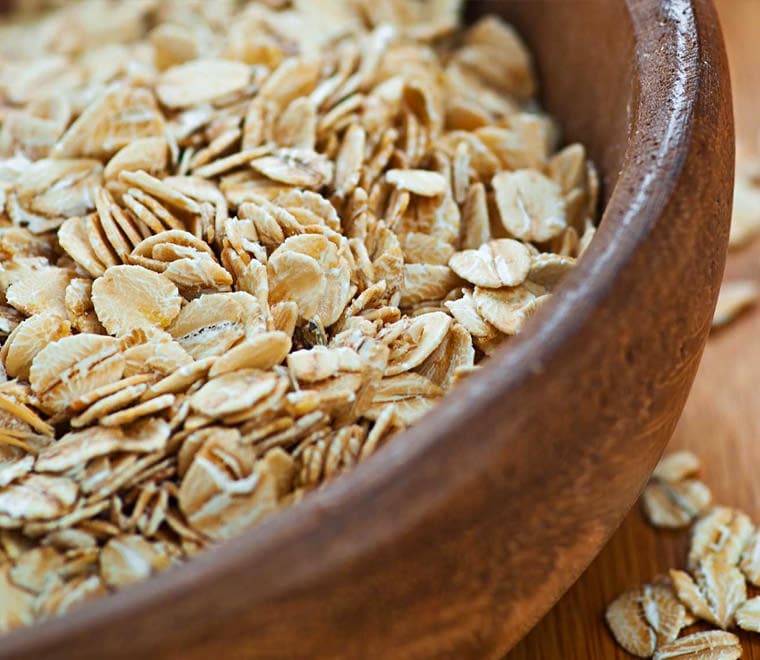 Ground oats in a wooden plate.