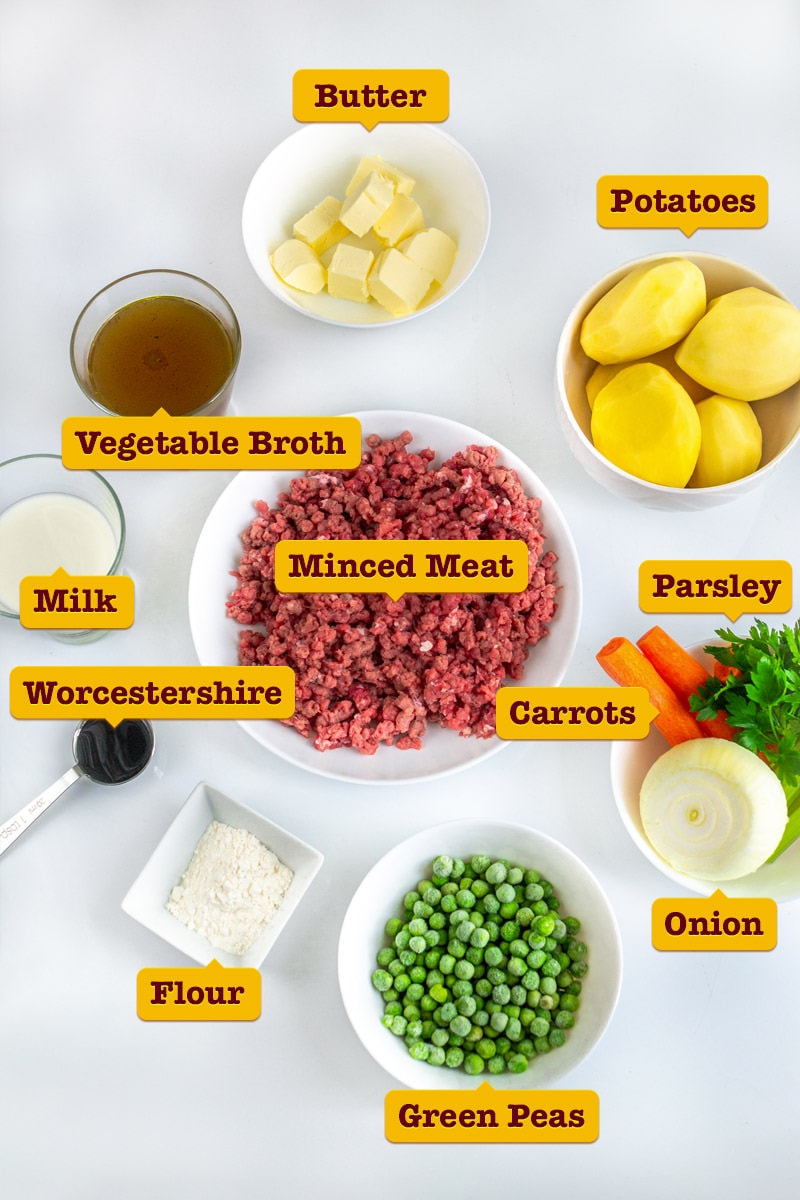 Ingredients for mince and tatties on a white table.