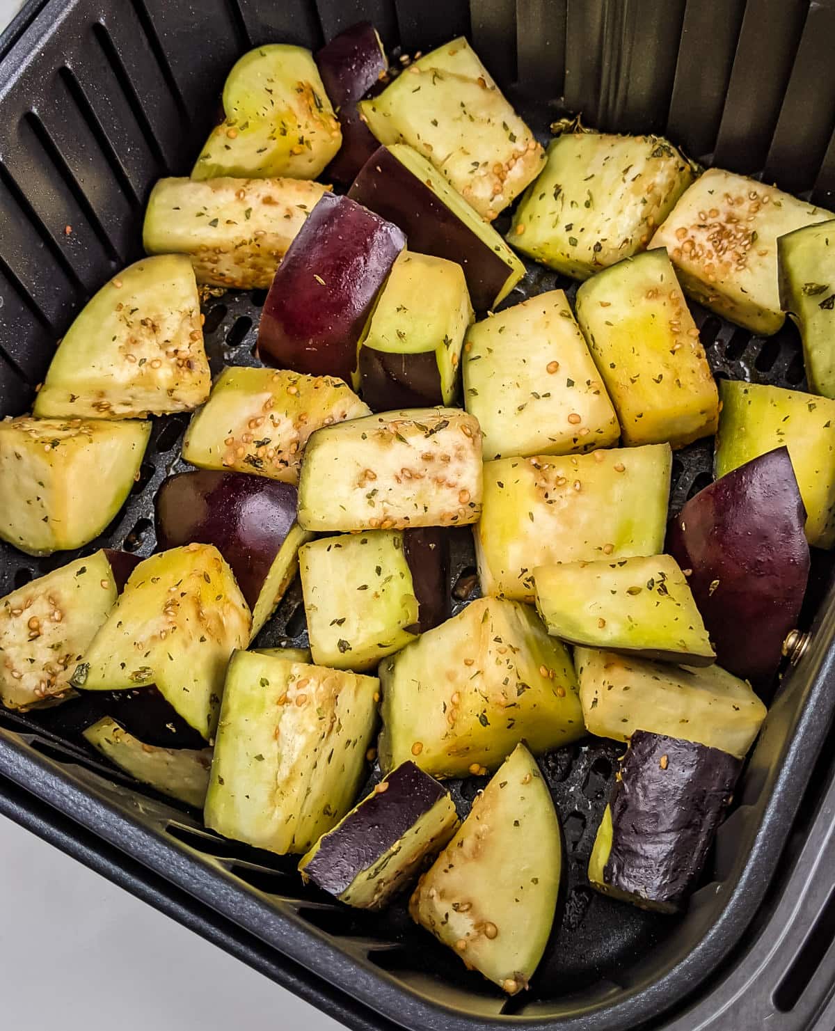 Raw eggplant bites seasoned with oregano and olive oil.