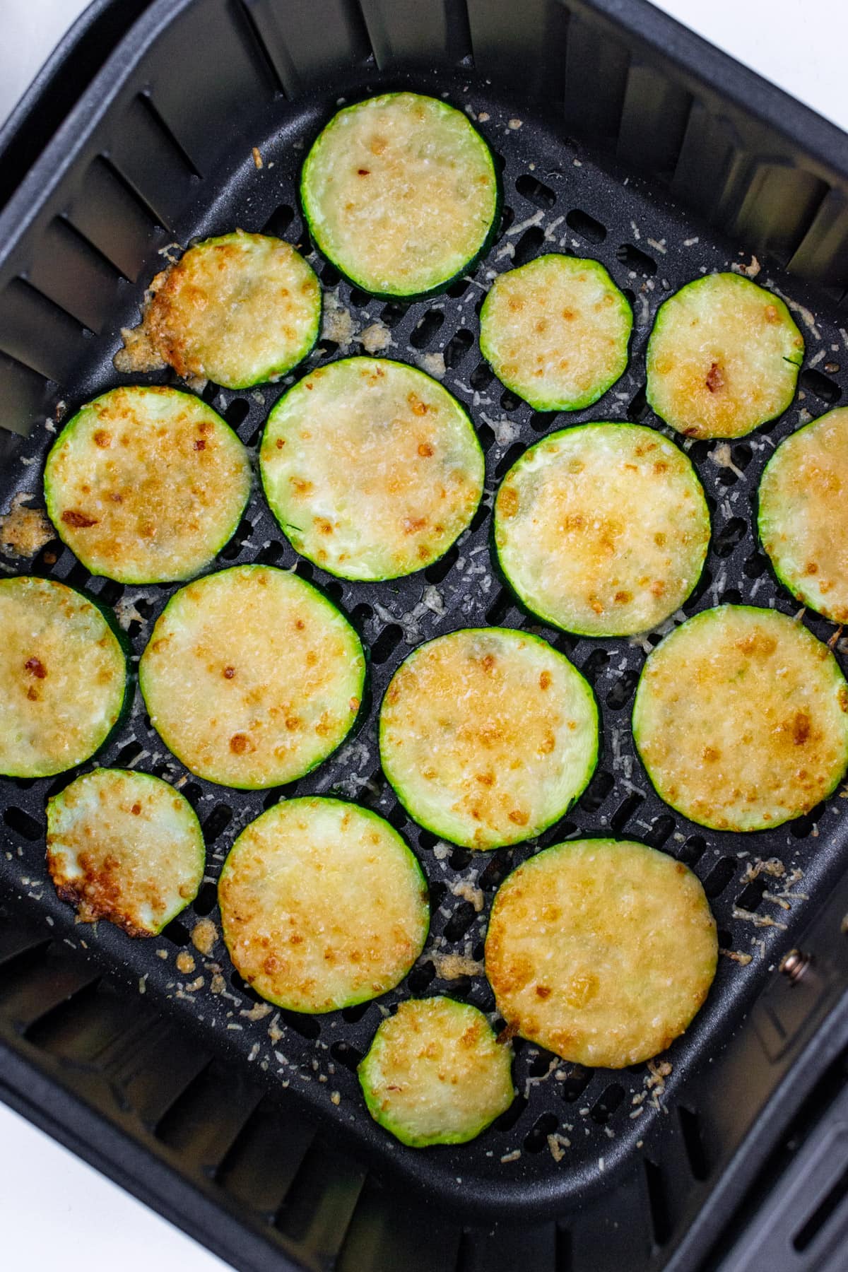 Baked zucchini chips with parmesan and garlic.