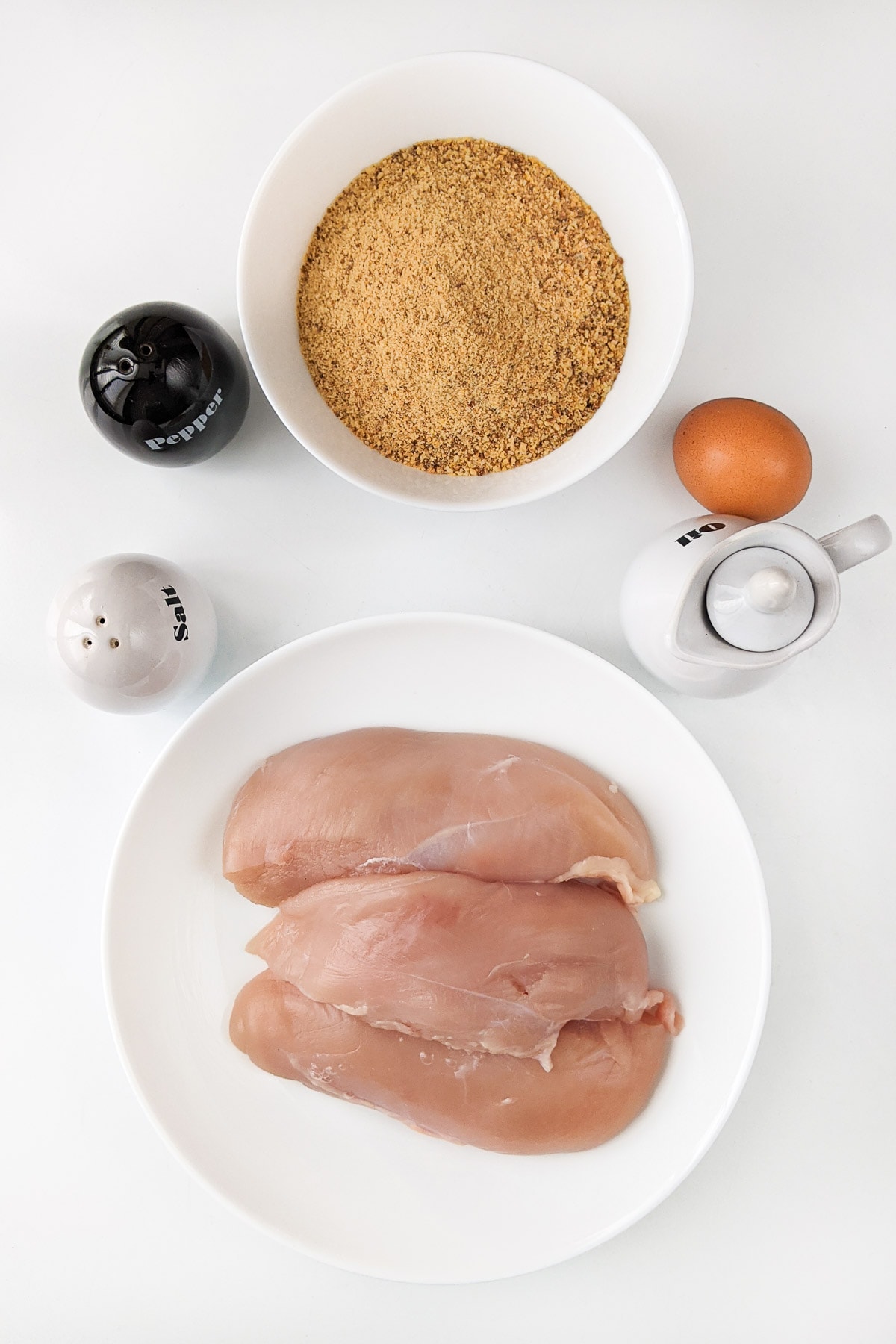 Chicken breasts with bread crumbs and one egg.