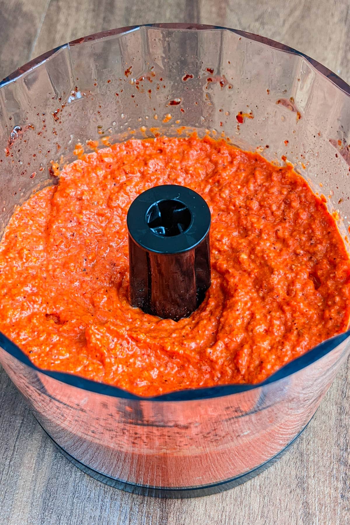 Mixing Romesco sauce in a mixer.