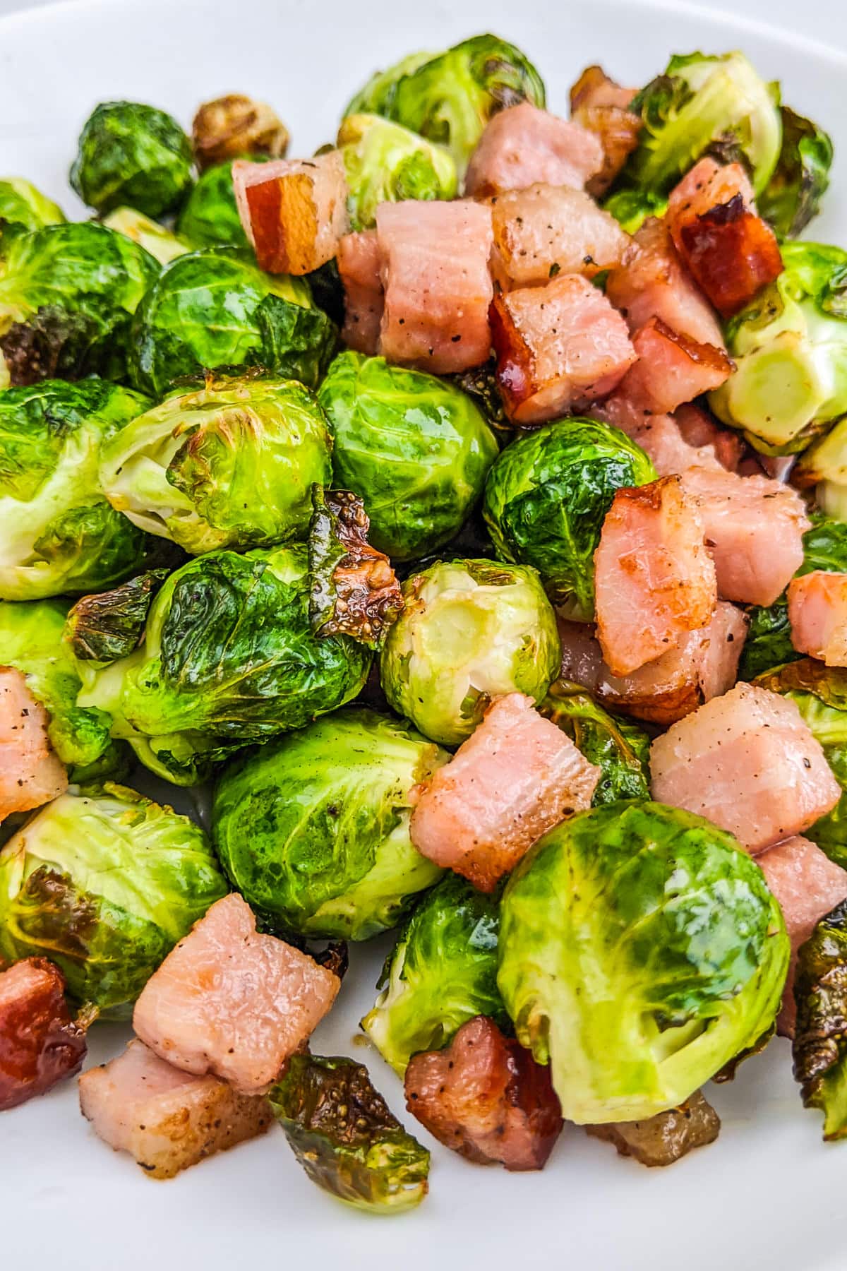 Close look of brussels sprouts in air fryer.
