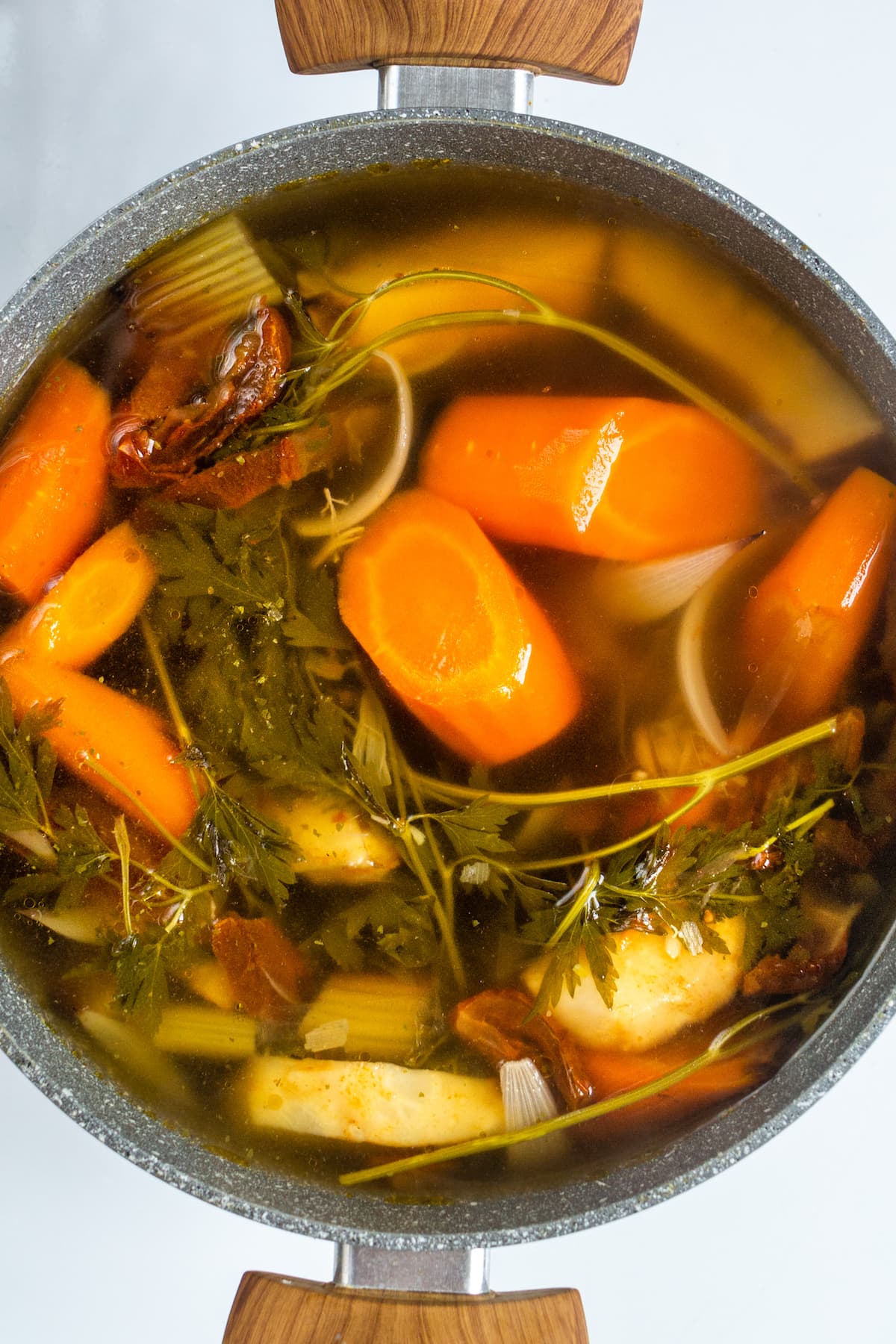 Top view of boiled vegetables for a vegetable broth.