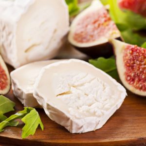 Sliced ripened-soft goat cheese sliced figs.