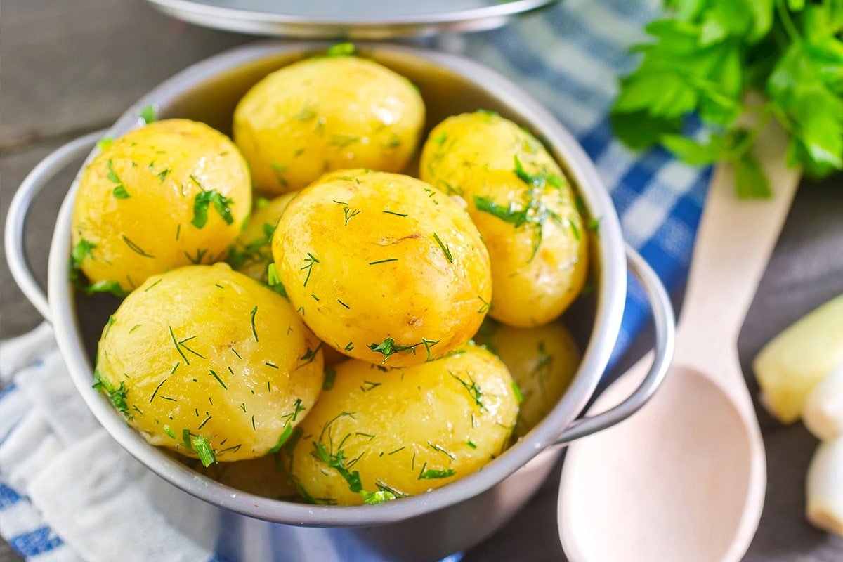 Close look of boiled potatoes with dill.
