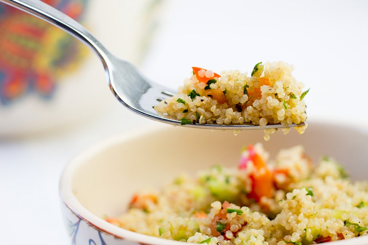 Fork with quinoa cold salad.