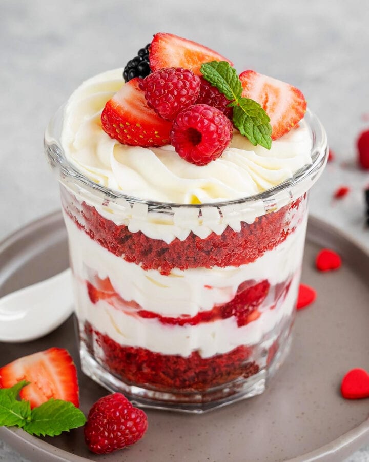 Strawberry trifle with whipped cream in a glass.