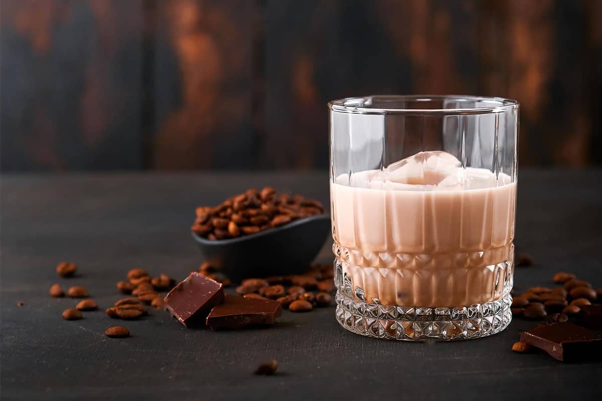 Close look of a glass with Irish Cream with coffee and chocolate.