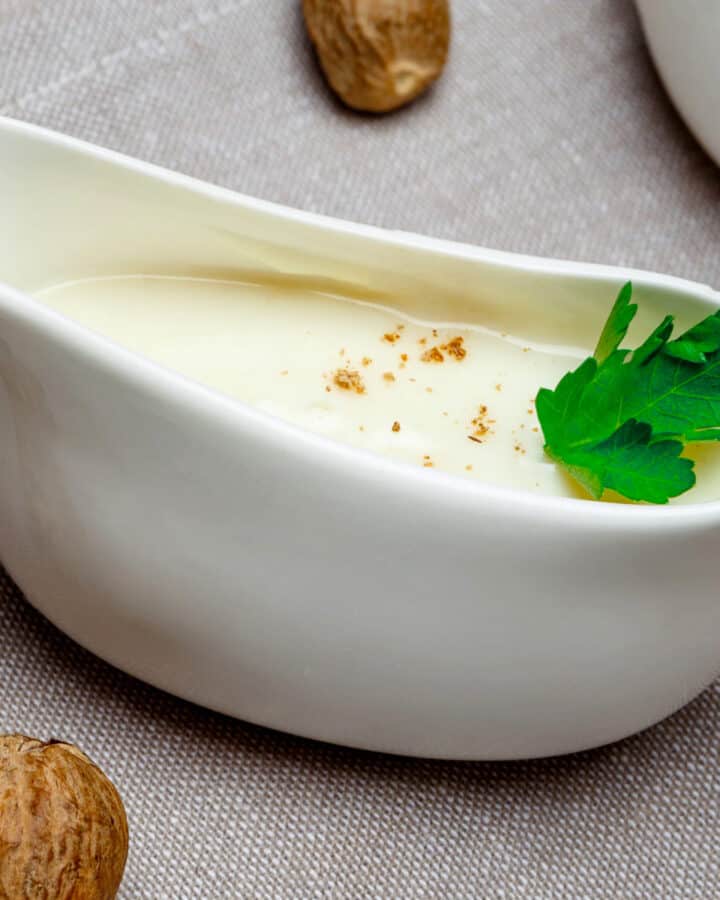 Close look of creamy sauce on a table.