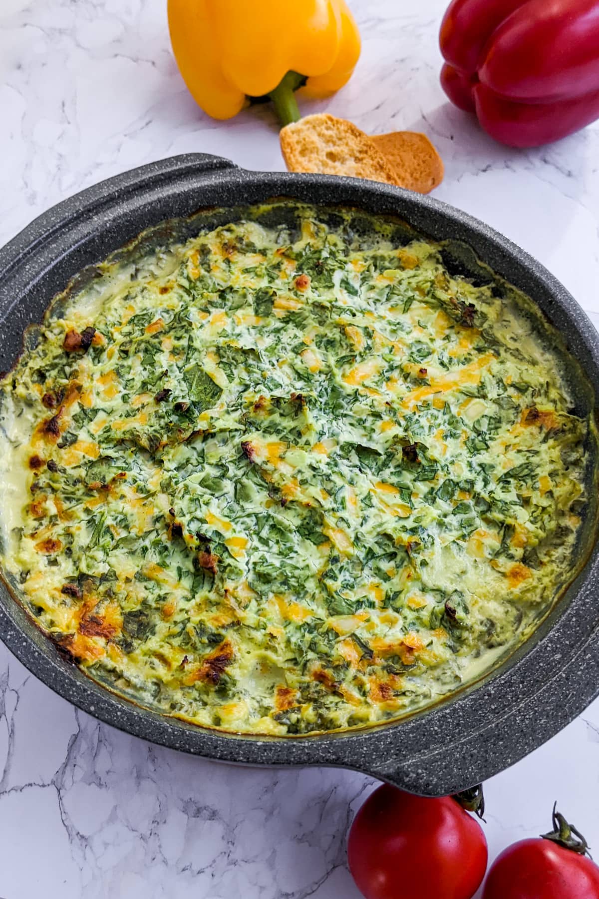 4-ingredient spinach dip on a marble table.