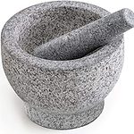 Mortar and pestle on white background.
