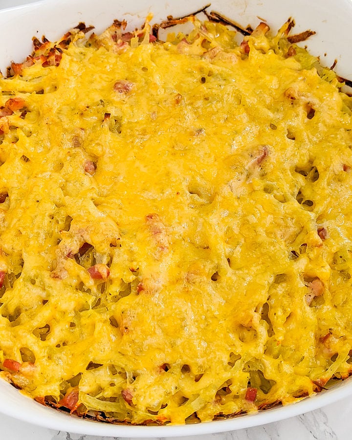 White casserole with hash brown and bacon.