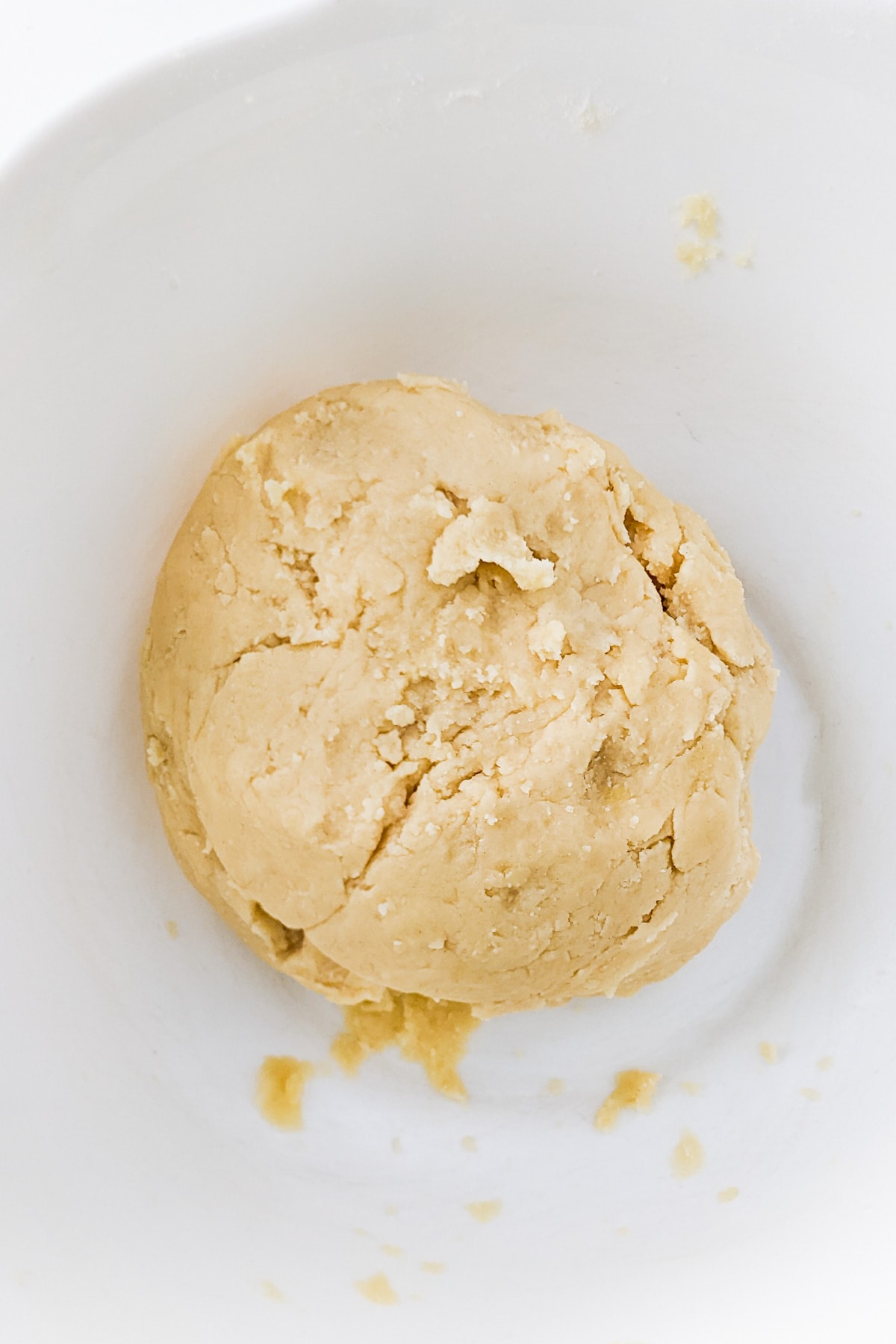 Deep bowl with sugar cookies dough.