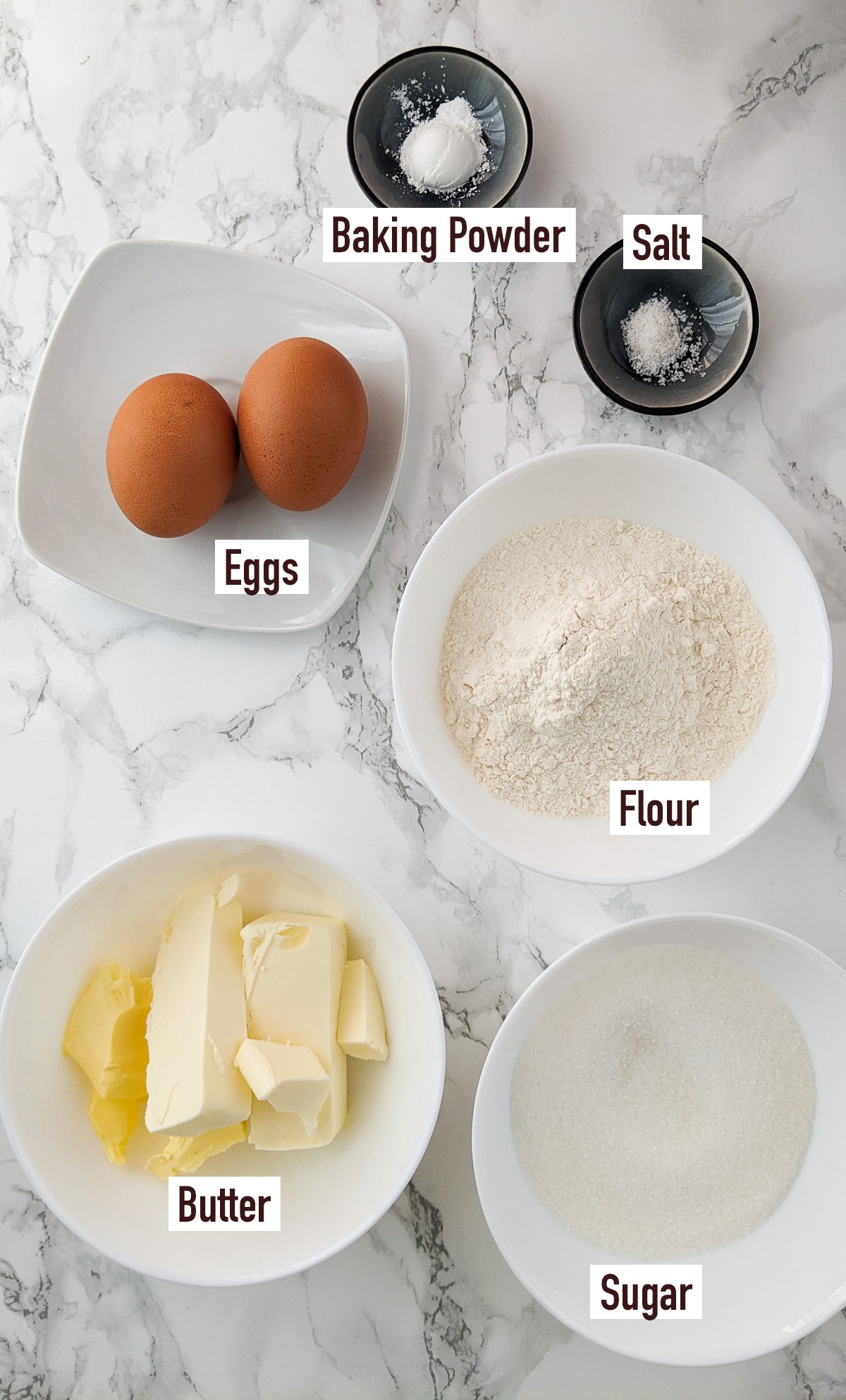 Top view of ingredients for an air fryer sponge cake.