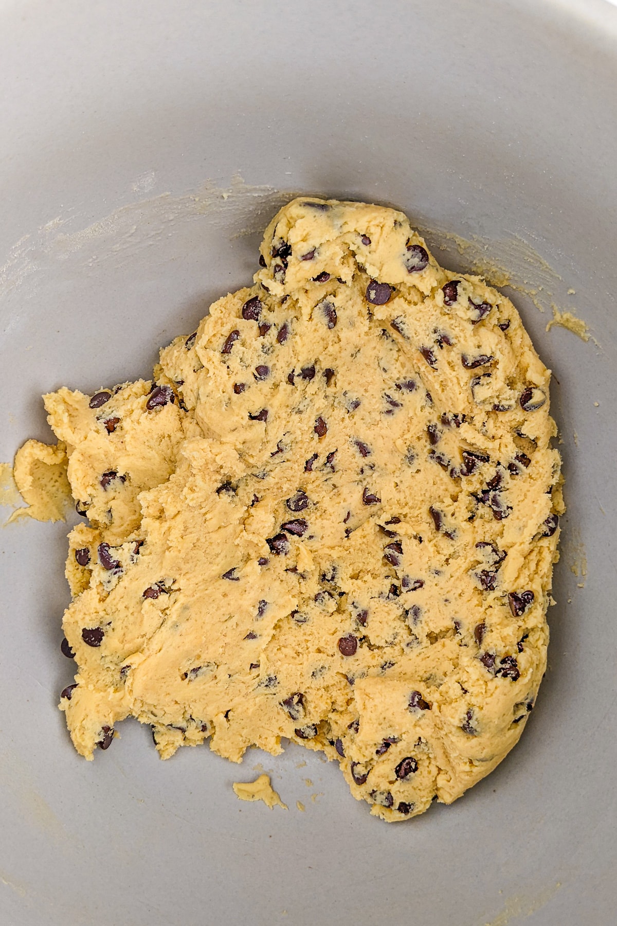 Mixed dough for chocolate chip cookies.