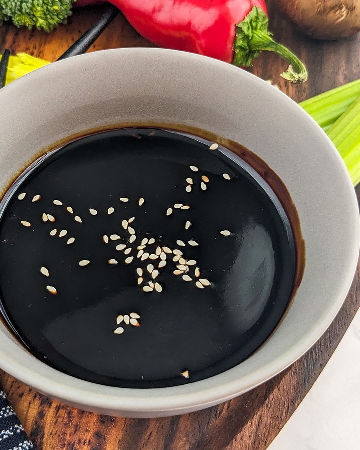 Close look of garlic soy sauce with sesame seeds.