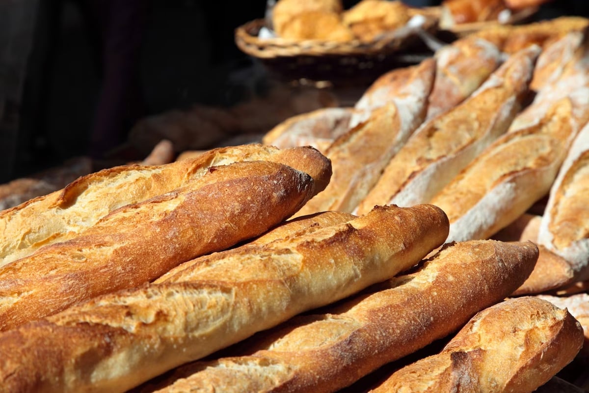 Different types of baguettes in a bakery.