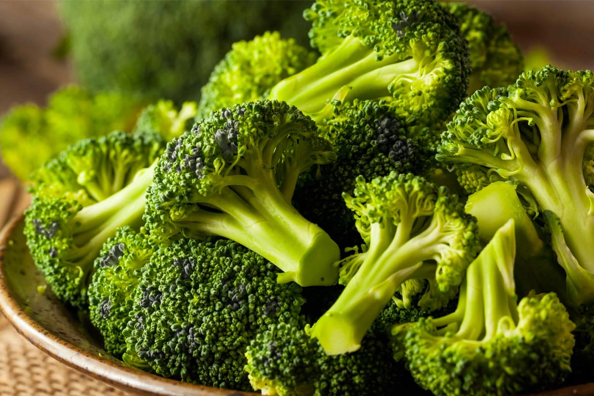 Close look of broccoli with black spots on them.