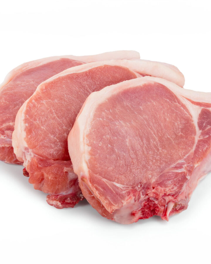Close look of 3 pieces of pork chops isolated on white background.