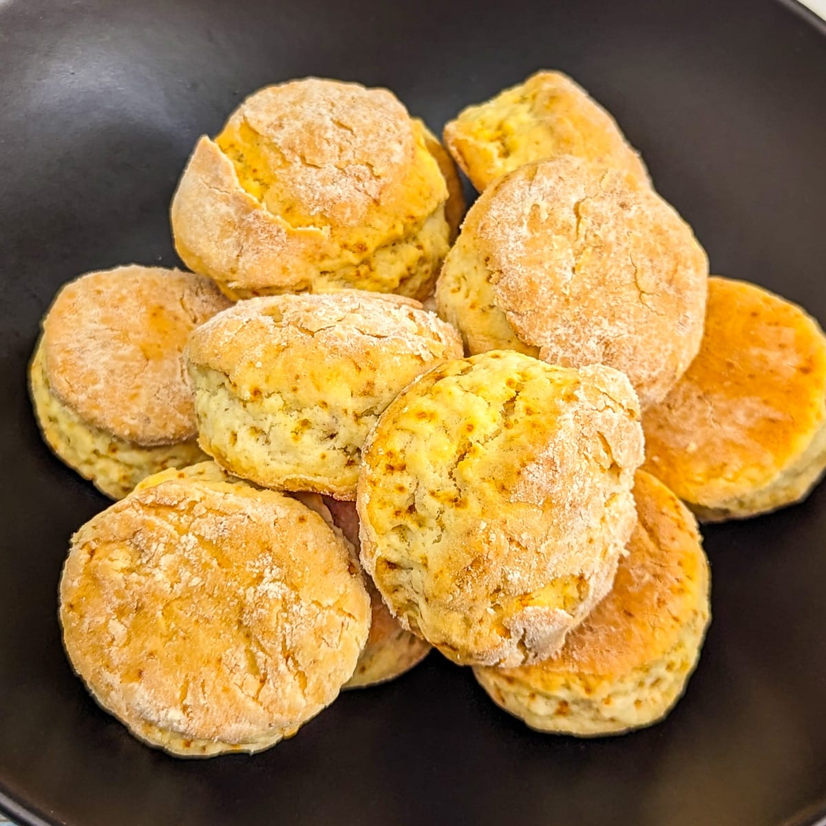 Black plate full with golden scones made from only 2 ingredients.