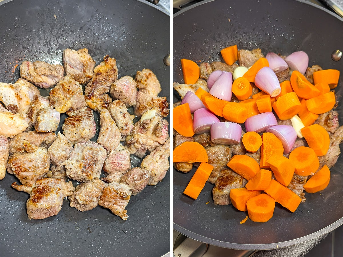 Frying meat in a wok together with sliced carrots, garlic and onions.